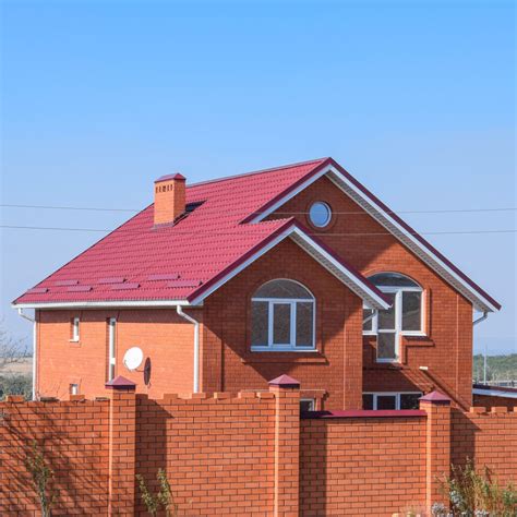 whitewash brick house metal roof|metal roofed brick house.